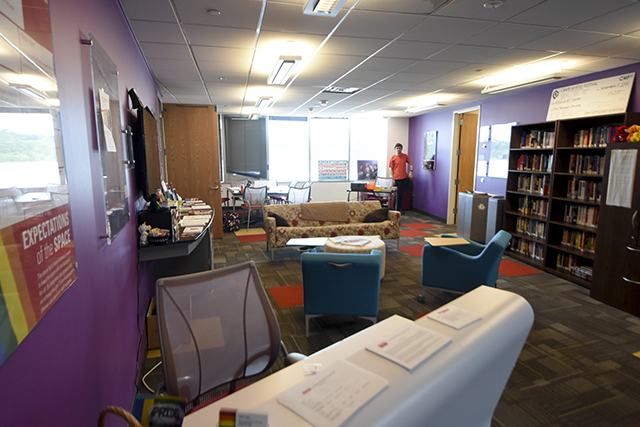 Hayden Youngquist, a senior studying electrical and computer engineering, helps out in the GLBT Center on the fourth floor of Talley Student Union on August 8, 2016.  Youngquist identifies as non-binary, asexual, and panromantic and hangs out at the GLBT Center frequently.  The GLBT center helps to engage and empower members of the GLBT community at NC State through providing support networks for students, offering identity-based and health-related information and resources, among other resources.