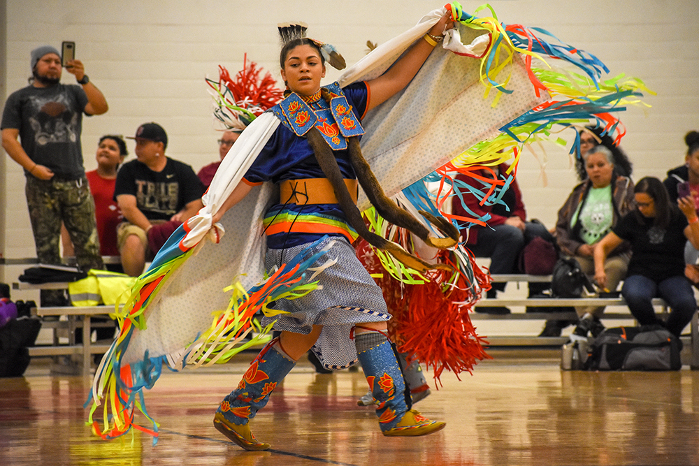 Jayla Davis dances during the 28th annual Pow-wow on Saturday, April 7, 2018 in Carmichael Gymnasium at NC State University.